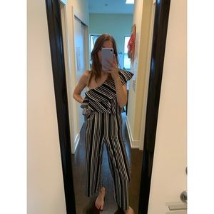 Haute Rouge Striped One Shoulder Jumpsuit